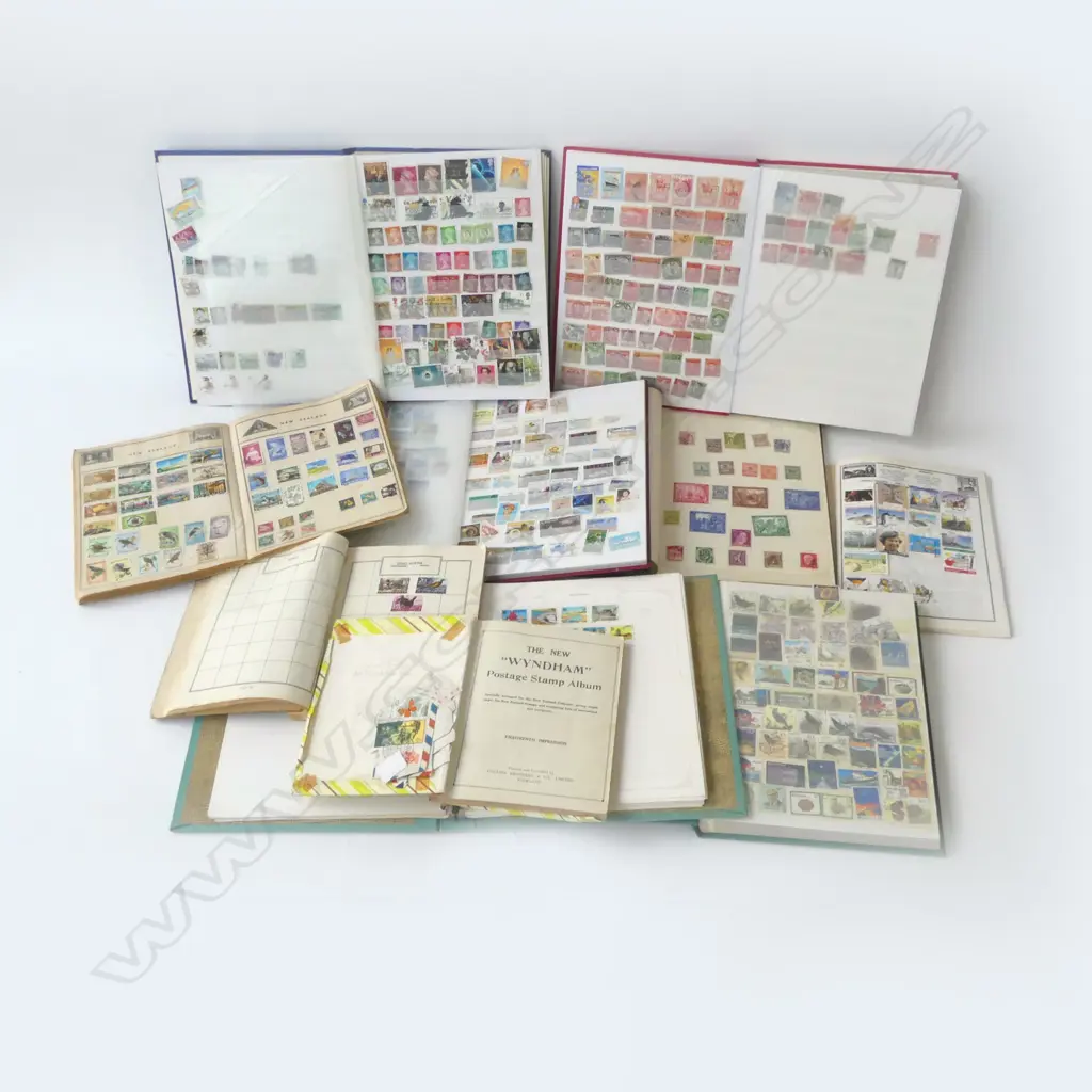 10 STAMP ABLUMS (SOME NEAR EMPTY) Image 1++