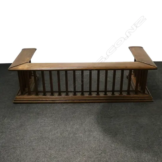 An early 1900s oak fire fender,