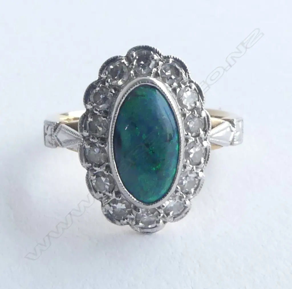 18CT GOLD DIAMOND AND BLACK OPAL RING  valuation  SIZE I 1/2 Image 1++