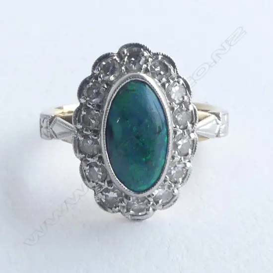 18CT GOLD DIAMOND AND BLACK OPAL RING  valuation  SIZE I 1/2