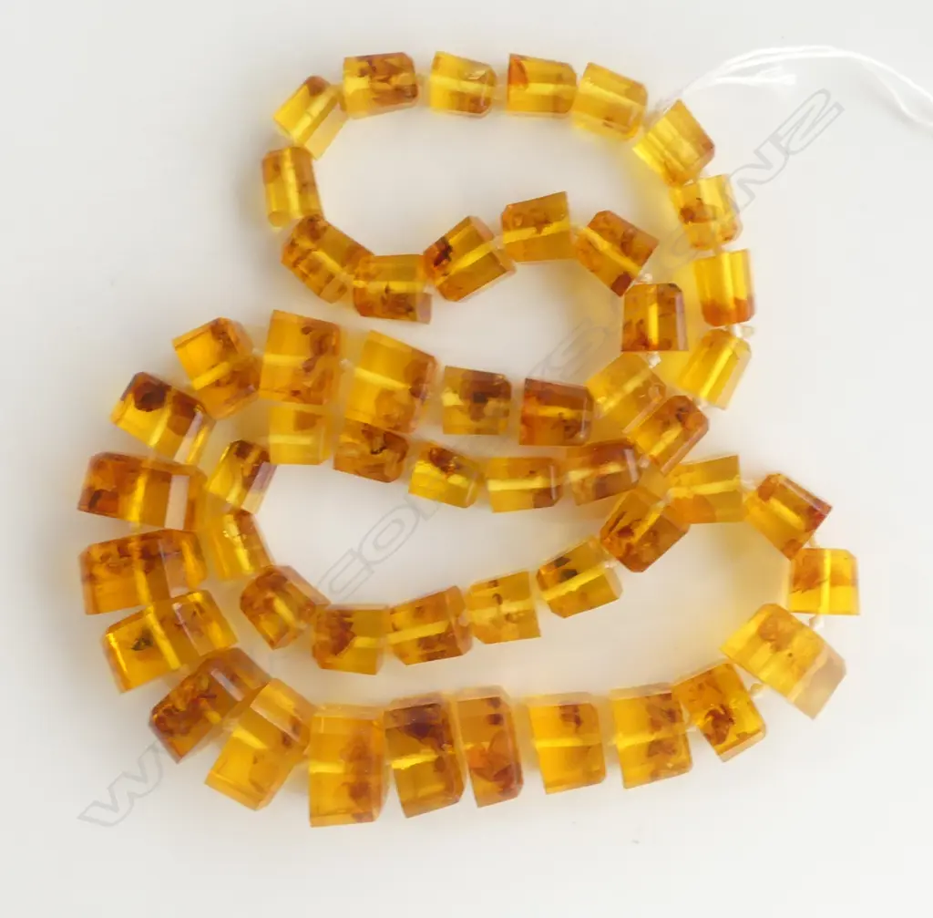  PRESSED AMBER HANDKNOTTED NECKLACE Image 1++