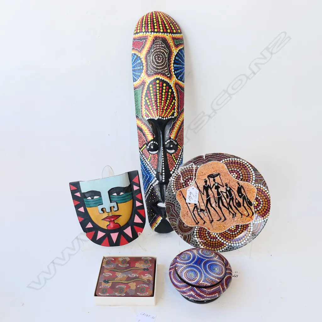 FIVE ABORIGINAL ARTIFACTS, 2 MASKS (LONGEST 49MM) 1 BOX, 1 PLATE AND 1  BOX OF COASTERS Image 1++
