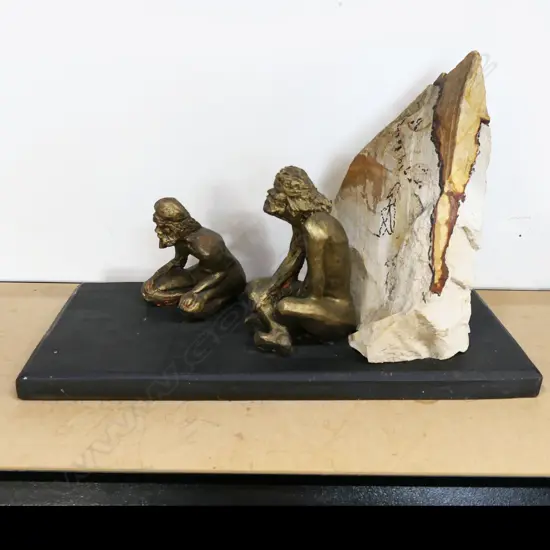 SCULPTURE OF 2 ABORIGINES SITTING BY A ROCK ON BASE, L.400MM