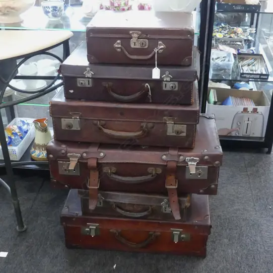 6 VINTAGE LEATHER SUITCASES