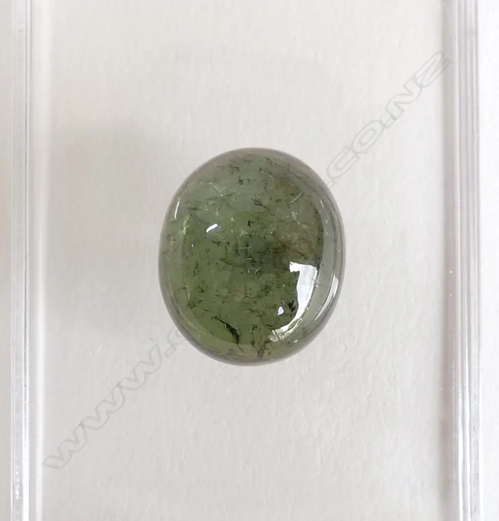 28.23CT GREEN TOURMALINE CABOCHON, HIGH DOME SHAPE. 18x15x11mm Image 1++