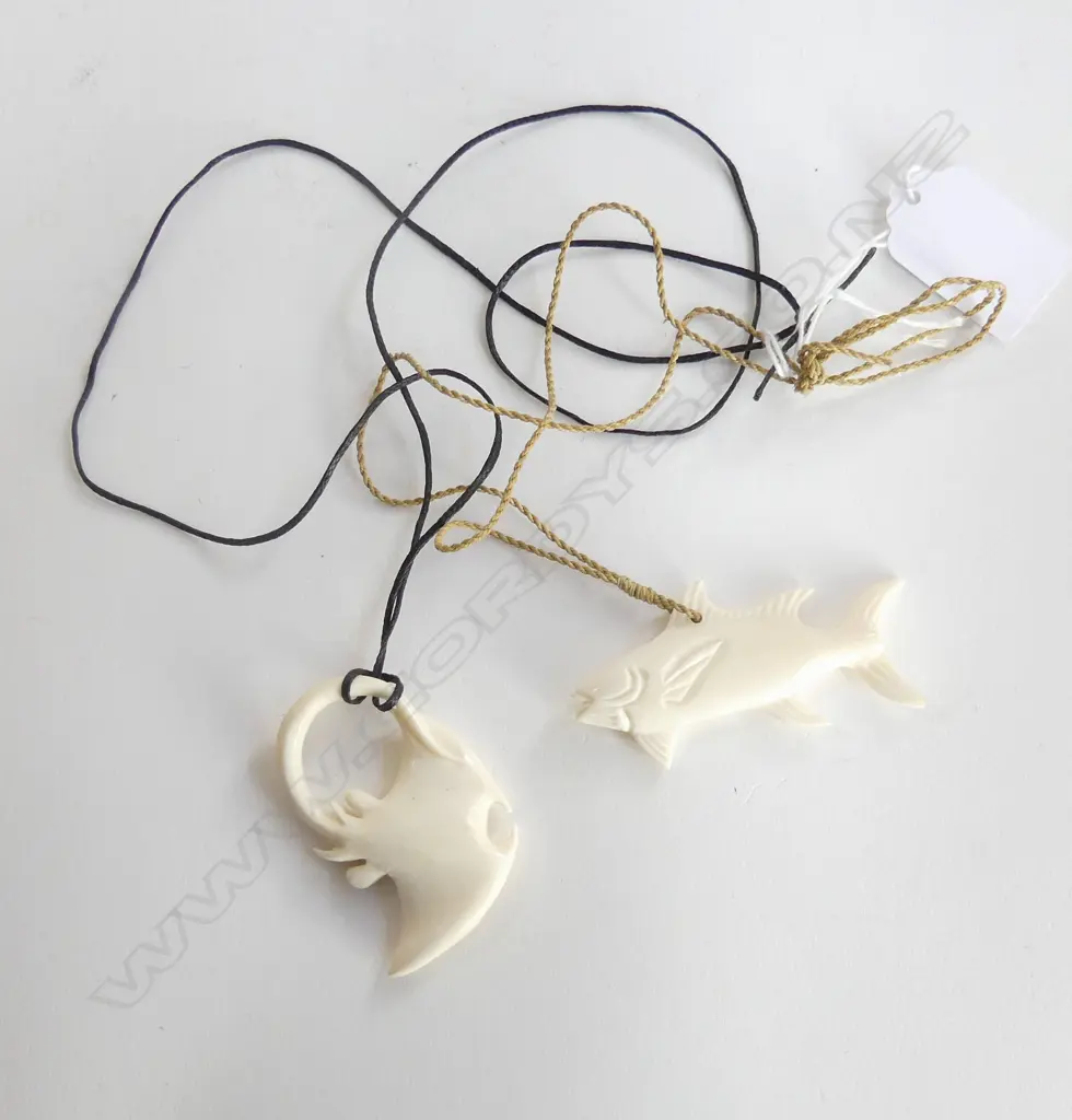 2 CARVED BONE PENDANT NECKLACES; TUNA & STING RAY W.65mm Image 1++
