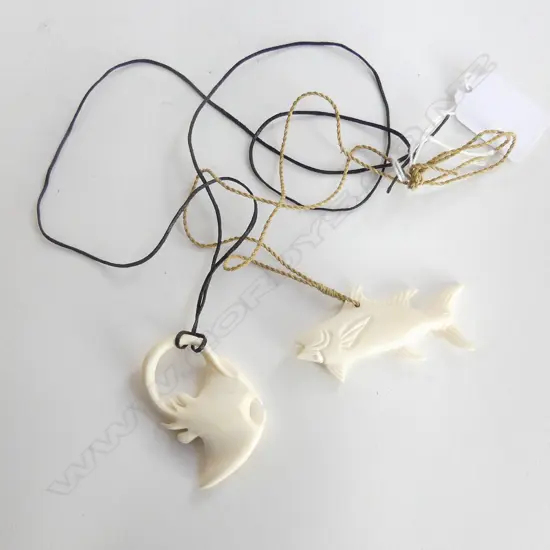2 CARVED BONE PENDANT NECKLACES; TUNA & STING RAY W.65mm