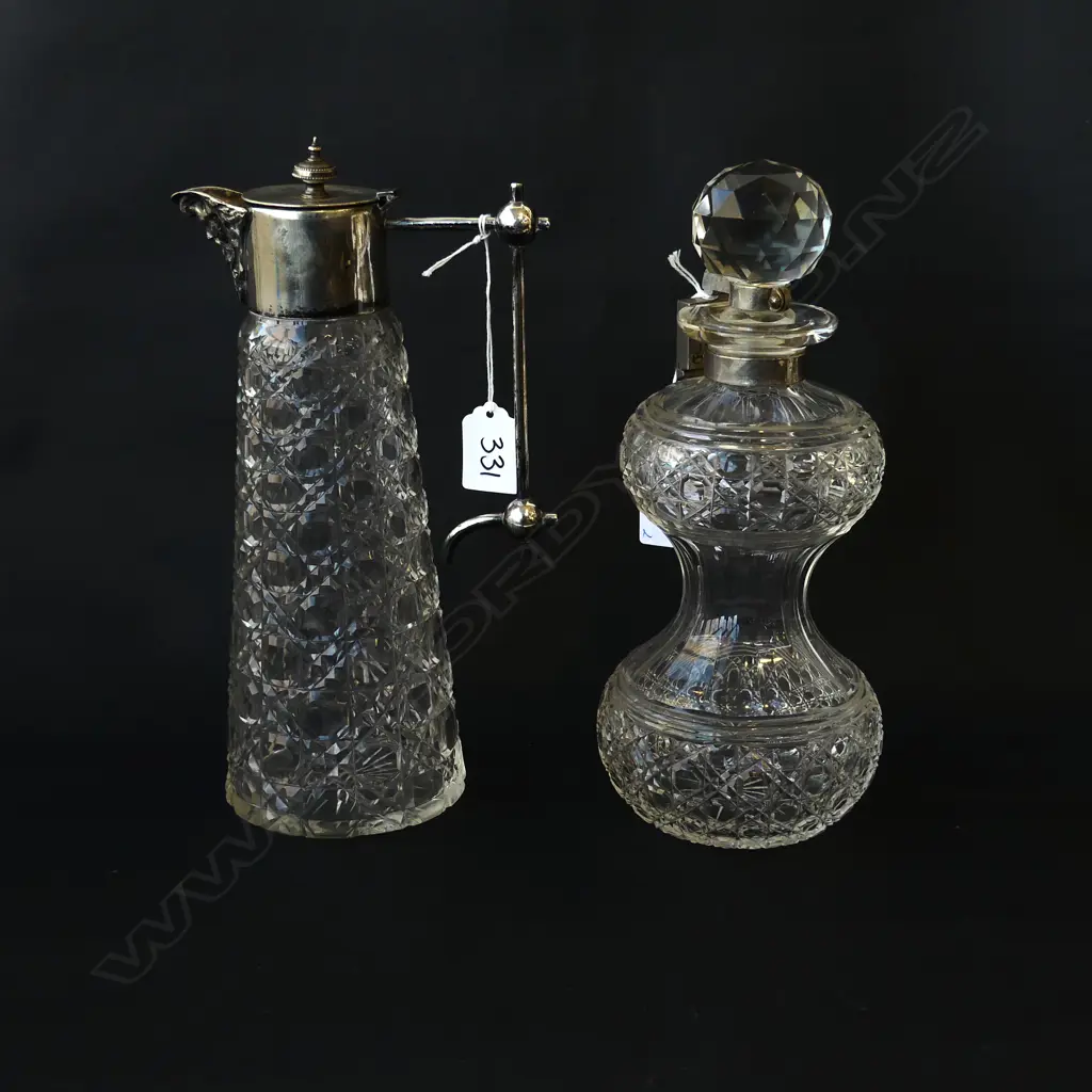 TWO CRYSTAL DECANTERS(PROBABLY 1920s), ONE WITH INTEGRATED LOCKING SYSTEM (H.275mm) & OTHER WITH GEORGIAN STYLE SPOUT, H Image 1++