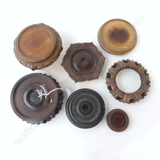 7 ASST. CARVED WOODEN ORIENTAL VASE STANDS (1 CRACKED) 140mm dia