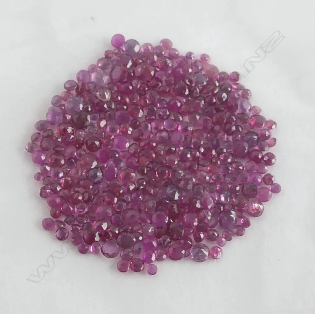 20ct FACETED RUBIES, ROUND Image 1++
