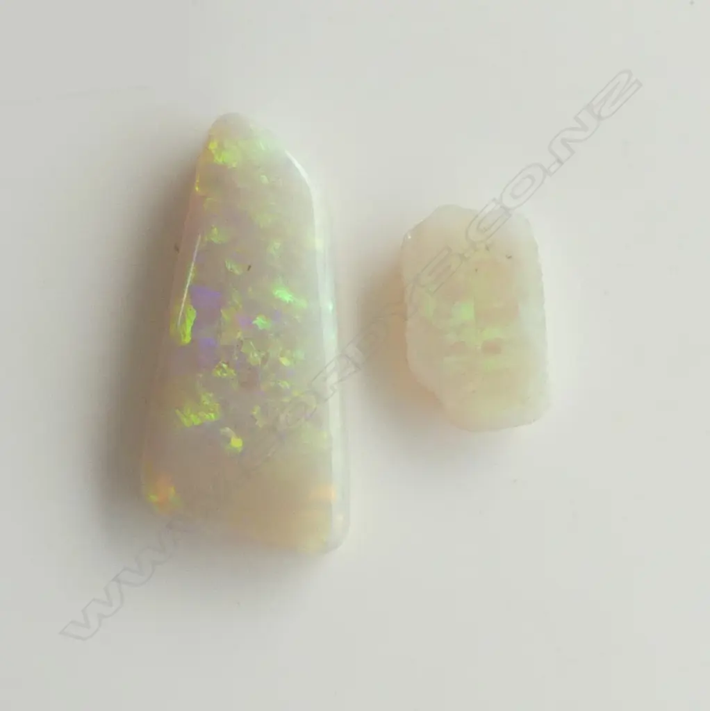2 UNSET OPAL GEM STONES: the larger 25 x 12mm approx with good fire & red tone Image 1++