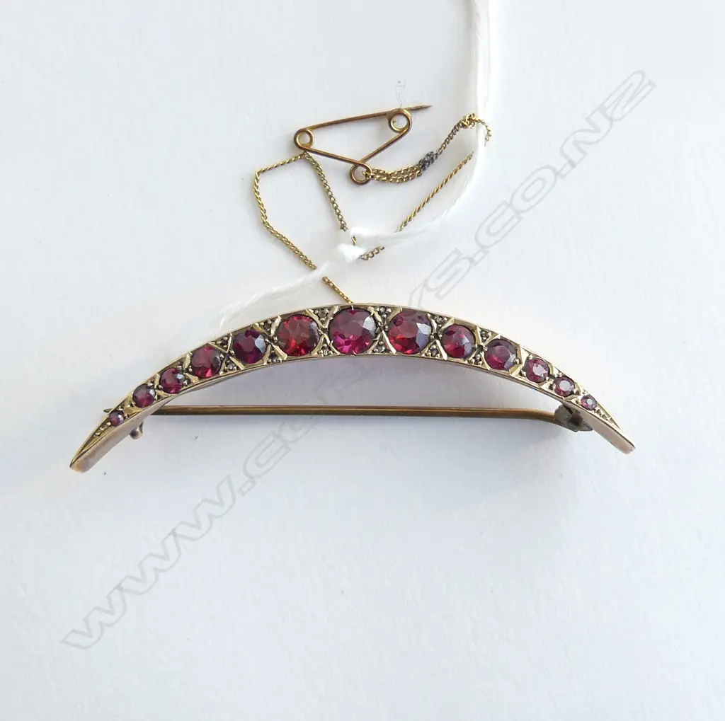 early 20thC 9ct YELLOW GOLD & ALMADINE GARNET CRESCENT BROOCH small diamond highlights. Width 62mm 4.5gms Image 1++
