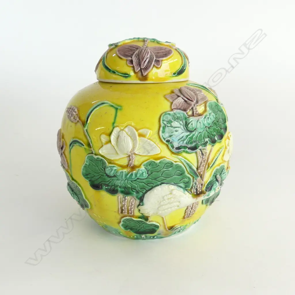 OLD CHINESE LIDDED JINGER JAR WITH APPLIED GREEN & BROWN LOTUS DETAILING ON YELLOW COLORWAY, MAJOLICA FINISH, 120X150mm Image 1++