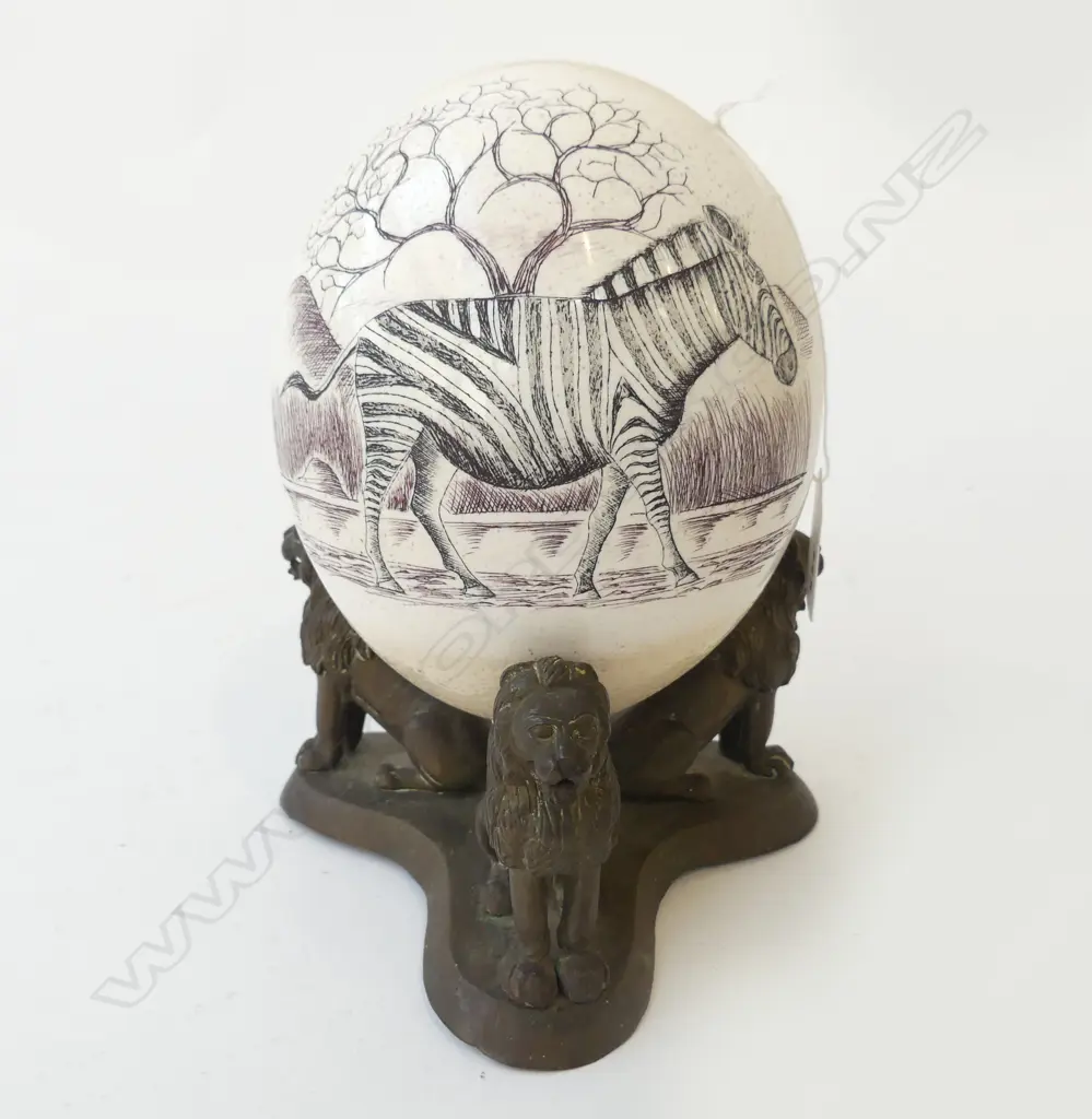 OSTRICH EGG WITH ZEBRA DECORATION ON A BRONZE LION BASE H 210 MM Image 1++