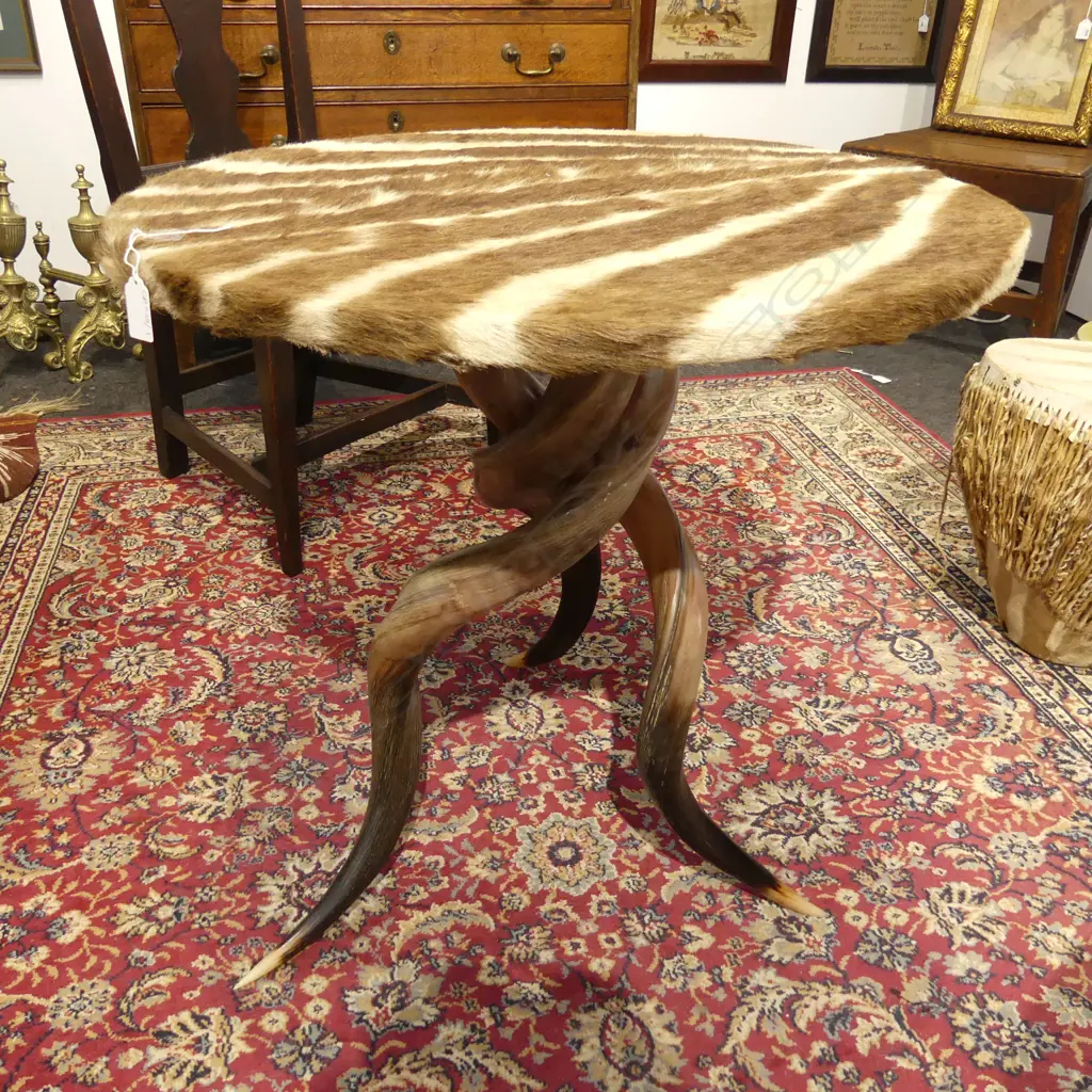 SIDE TABLE; ZEBRA HIDE TOP w. 3 HORN BASE H.600mm 620mm dia Image 1++