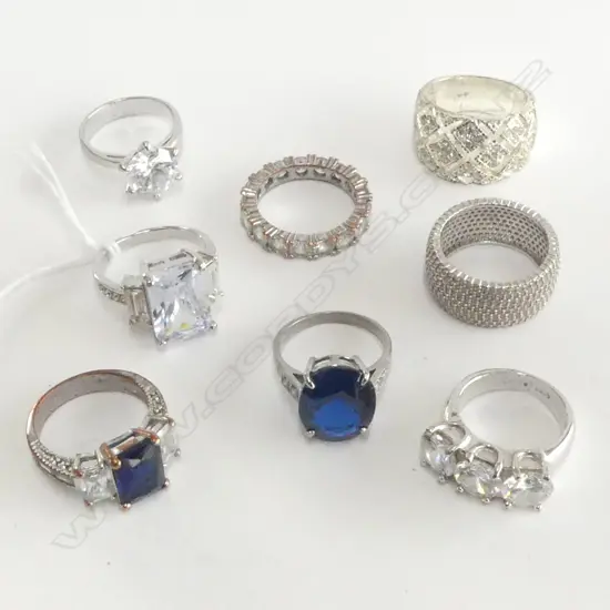 8 COSTUME RINGS