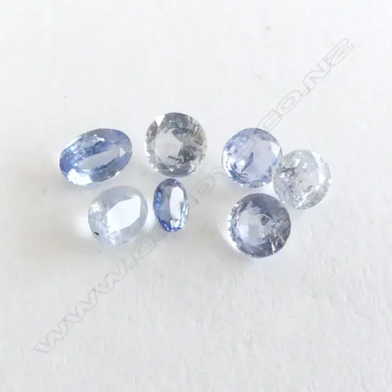 7 ASST. BLUE & WHITE SAPPHIRES 