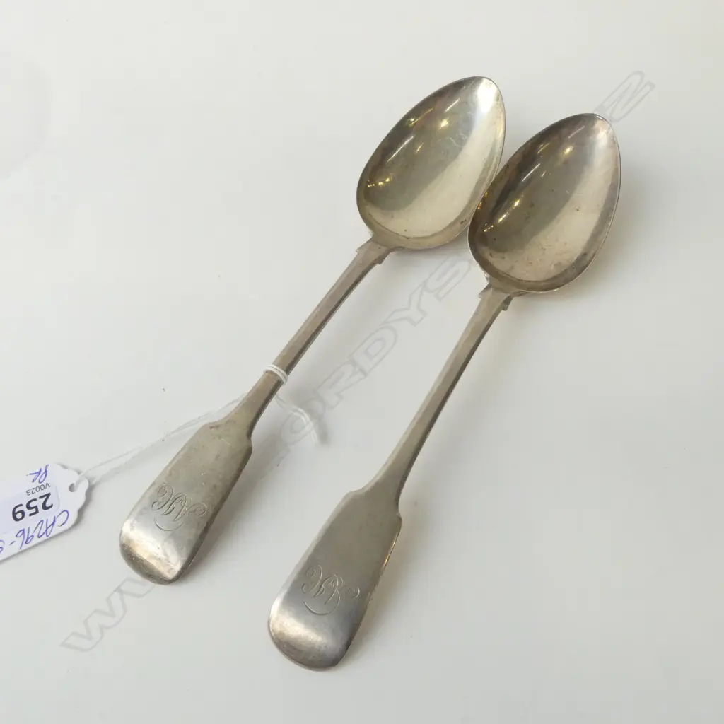 A pair of George III silver fiddle pattern shell back tablespoons Newcastle 1802 by William Lister 134gms Image 1++