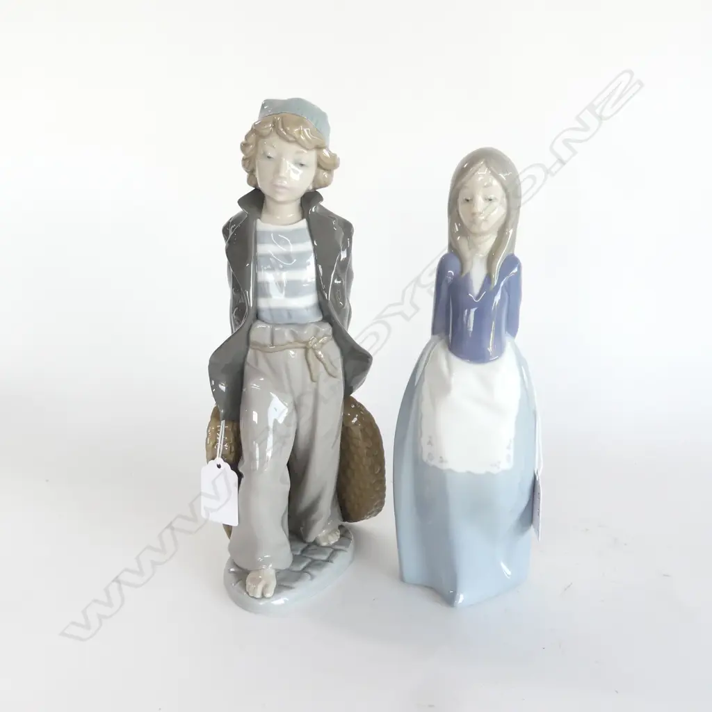 LLADRO YOUTH DRAGGING BASKETS H.260mm (sml chip to jacket) & NAO by LLADRO GIRL w APRON H.240mm Image 1++