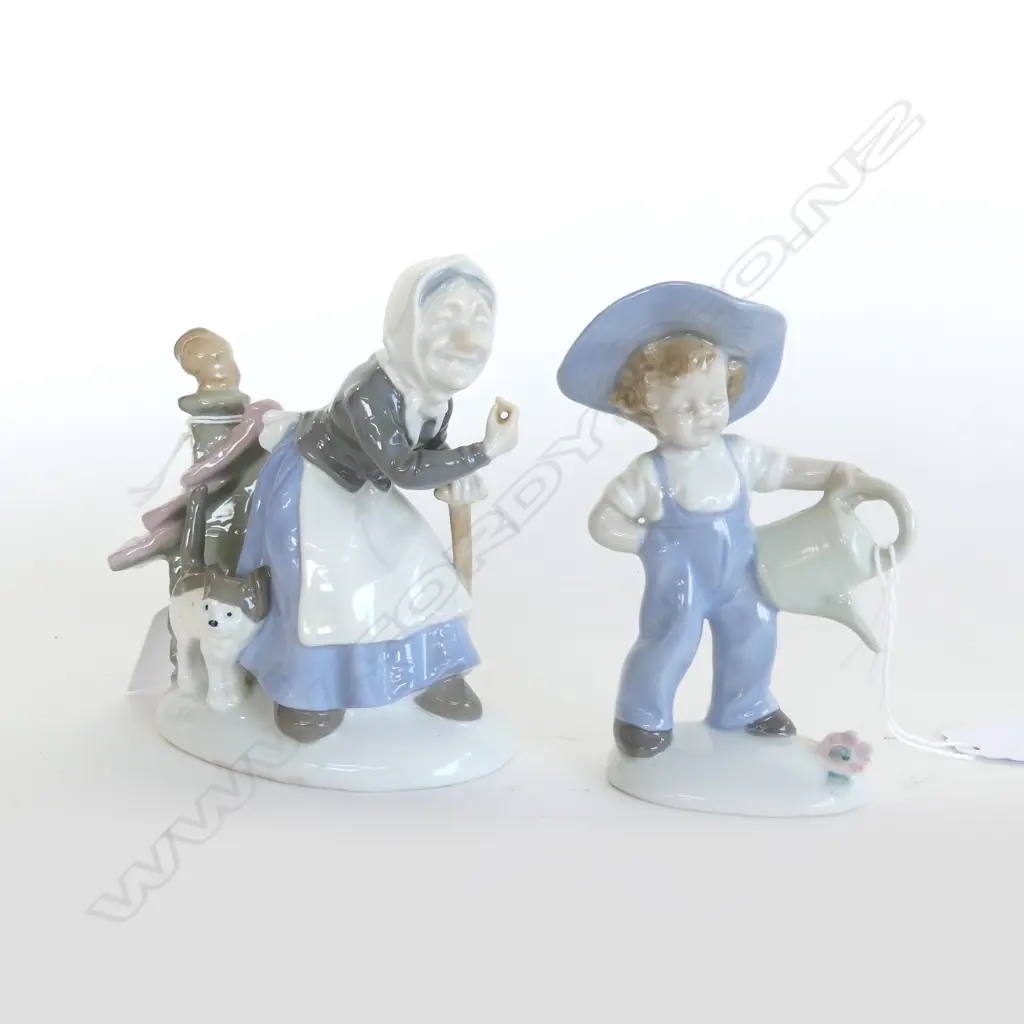 2 GERMAN PORCLAIN FIGURES LADY WITH CAT H120 & BOY WITH WATERING CAN H120 Image 1++