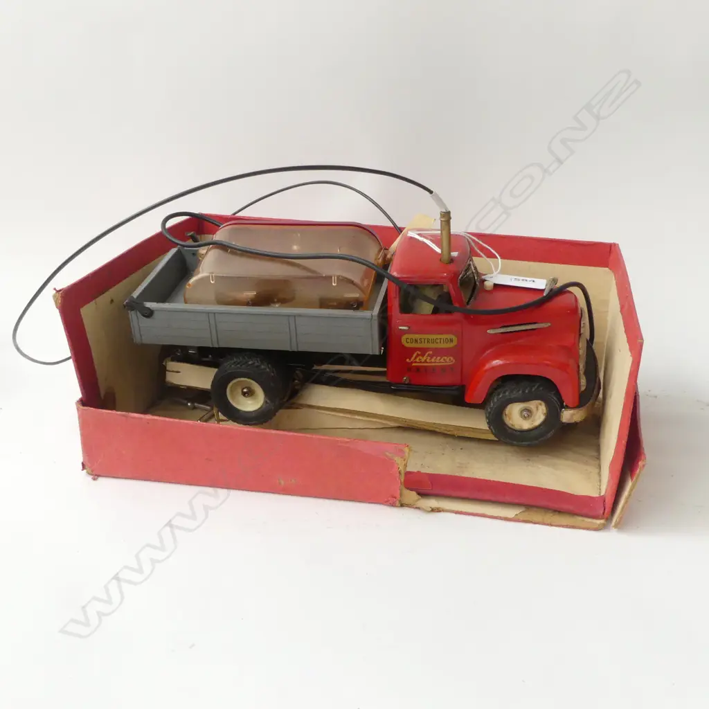 VINTAGE SCHUCO TINPLATE BATTERY OPERATED 'CONSTRUCTION' TIP TRUCK L.260mm. IN ORIG BOX  Image 1++