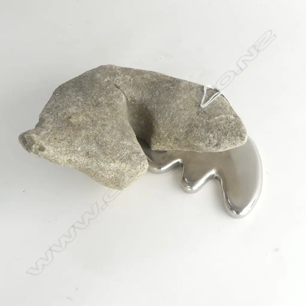 Dean Corbet (NZ) 'Overflow' sculpture.  Limestone & stainless steel. 400 x 150mm.  Provenance: From the Koula collection Image 1++