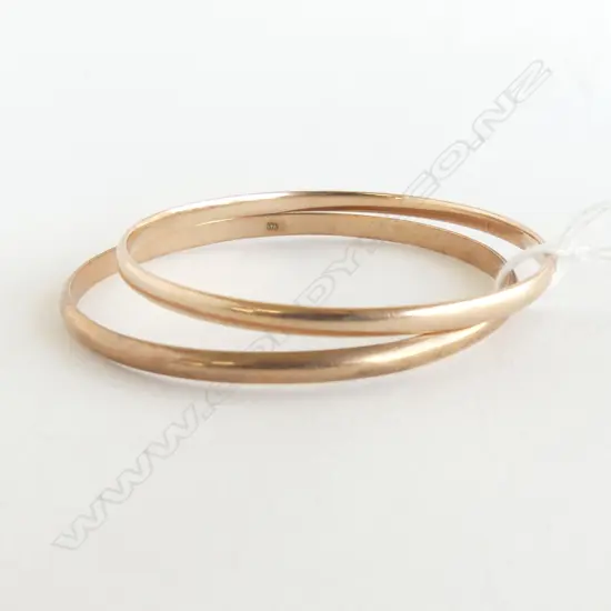 TWO 9CT  ROSE GOLD BANGLES 26.8gms
