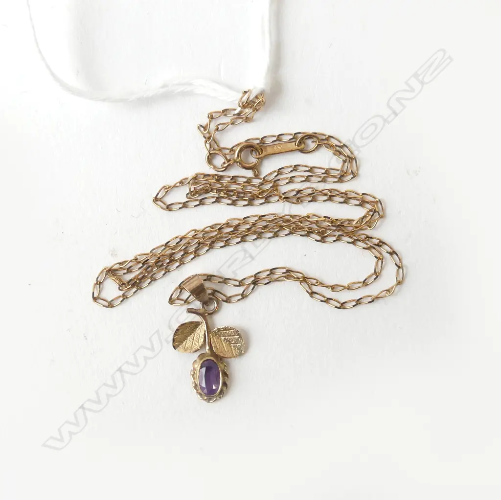 9CT AMETHYST PENDANT ON 9CT CHAIN 1.2gms Image 1++