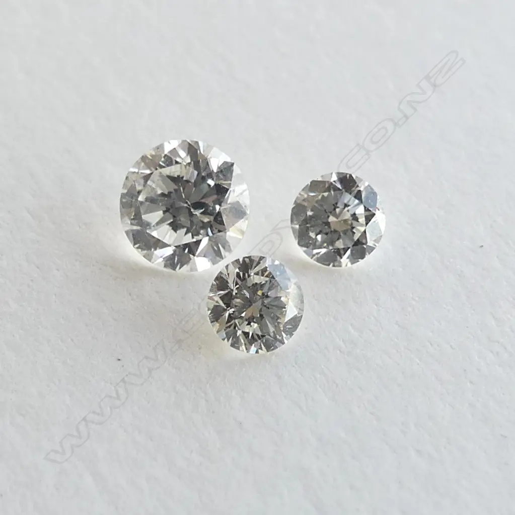 BAG OF THREE LOOSE DIAMONDS Image 1++