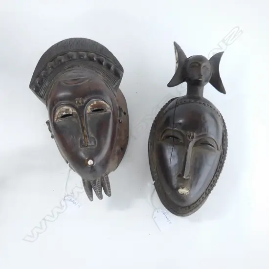 2 CARVED WOODEN AFRICAN MASKS H.300mm