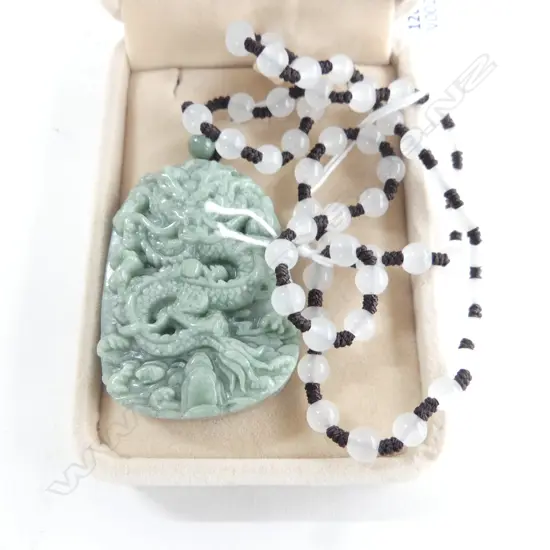   JADITE CARVED PENDANT ON BEAD & KNOTTED CHORD  