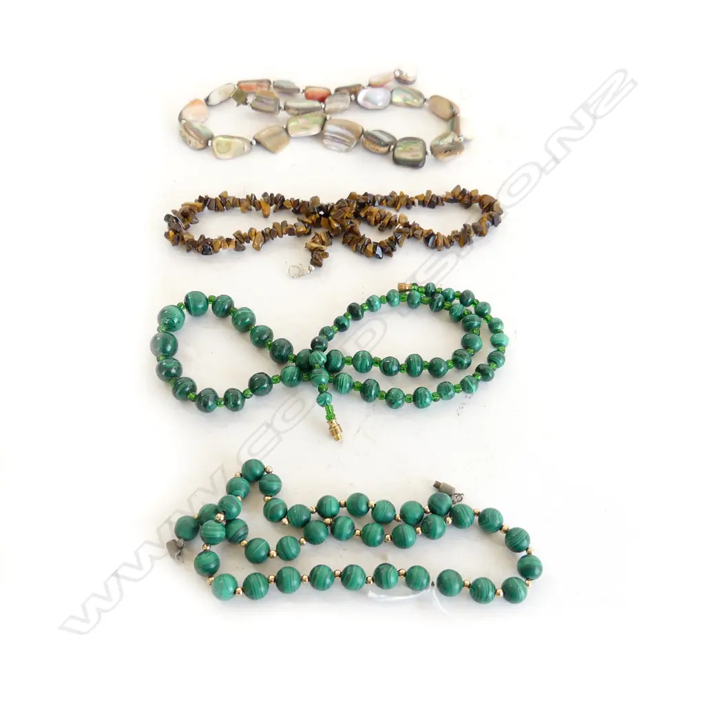 4 NECKLACES; 2 MALACHITE, 1 TIGERS EYE, AND 1 SHELL Image 1++