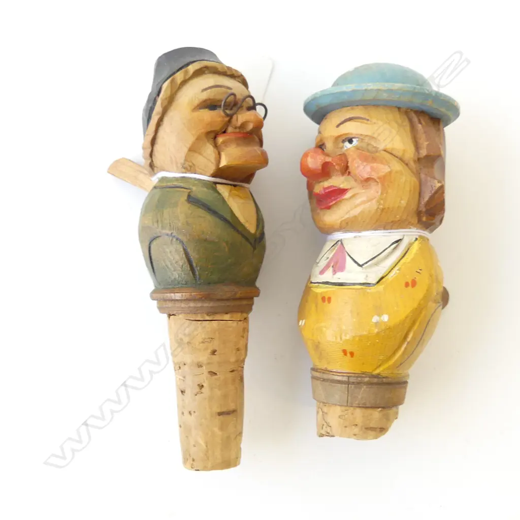 TWO CARVED BLACK FOREST GERMAN BOTTLESTOPS, ARTICULATED ONE AS MAN WITH FIGURE INSIDE HAT, OLD LADY MOVING JAW Image 1++