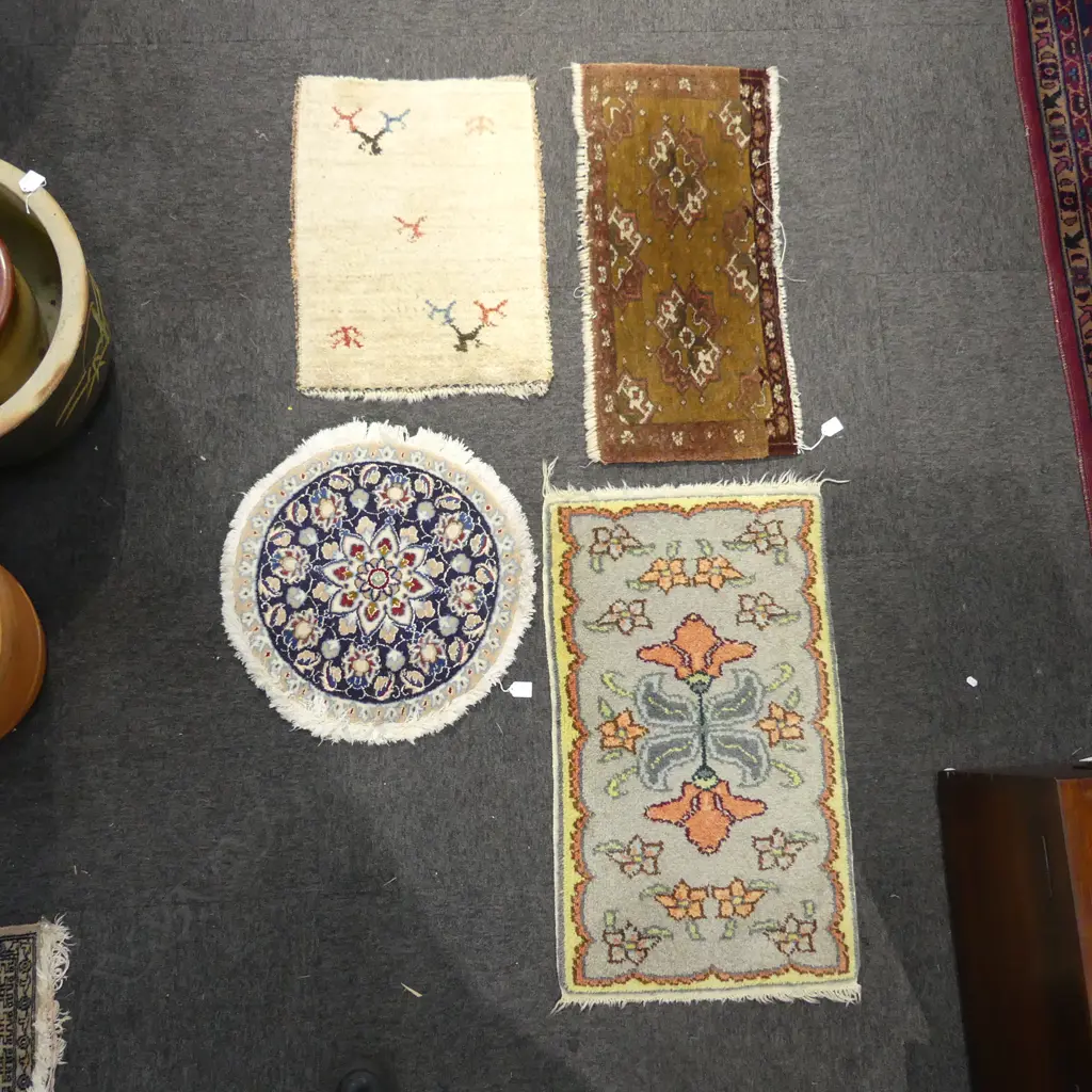 4 SMALL HAND KNOTTED RUGS; 1 470mm dia Image 1++