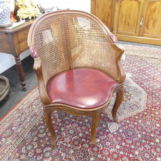 CANED BACK ARMCHAIR