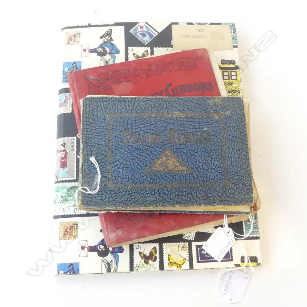 THREE VINTAGE STAMP ALBUMS Image 1++
