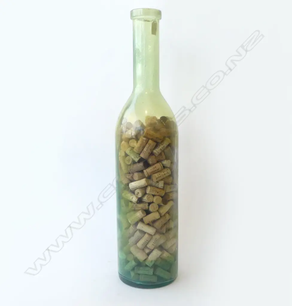 VERY TALL GREEN GLASS BOTTLE nearly full of corks H.750mm Image 1++
