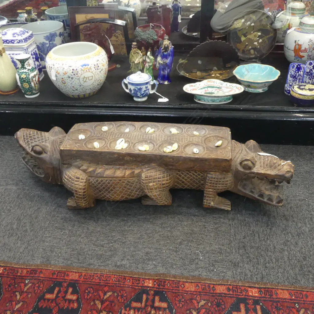 INDONESIAN CARVED WOODEN MANCALA / CONGKLAK GAME; DOUBLE HEADED CROCODILE FORM W.820mm Image 1++