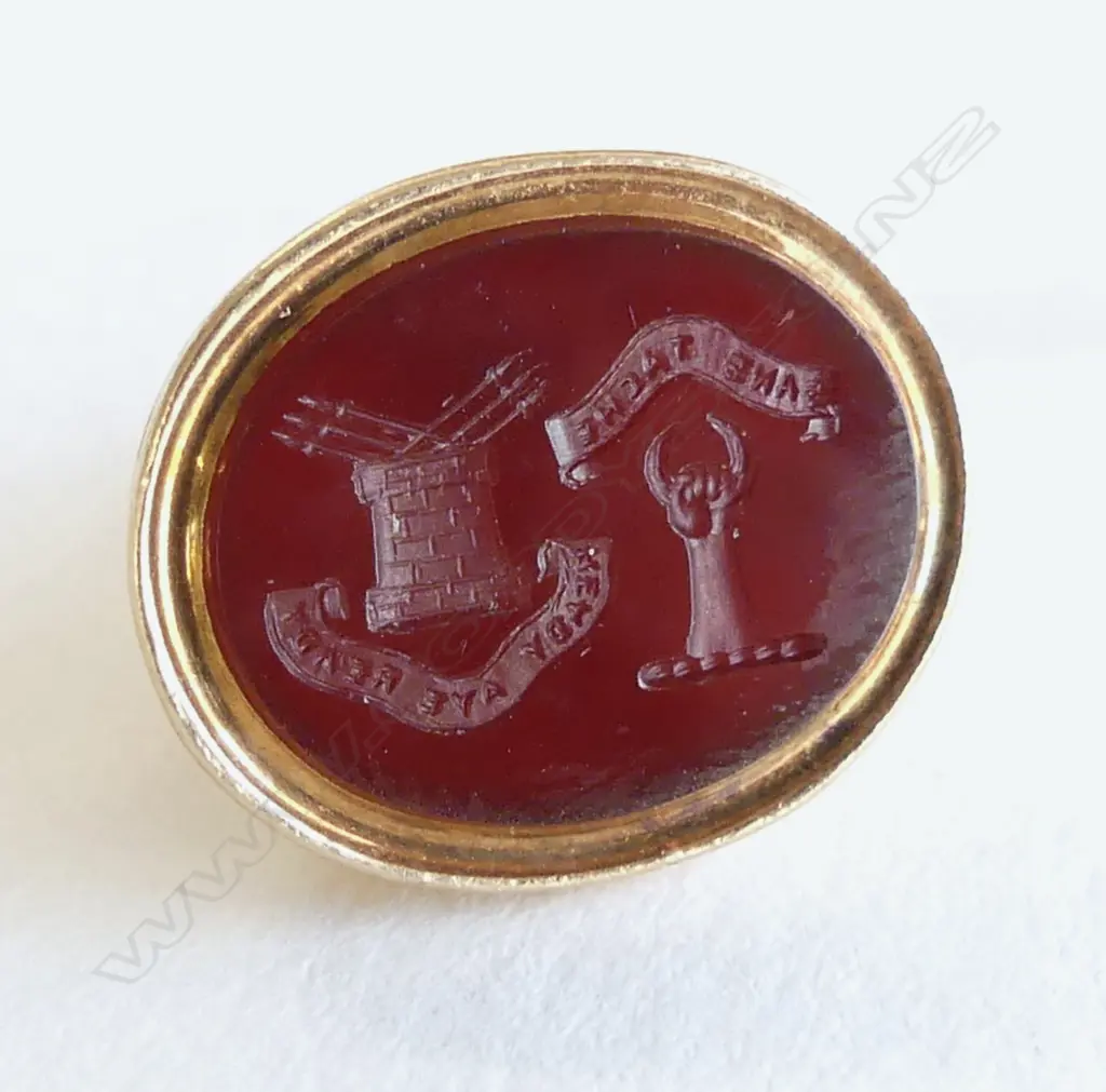 15ct FOB SEAL INTAGLIO CUT with crest of turret & raised fist with motto to the the ribbons 4.9gms Image 1++