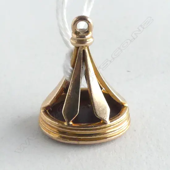 15ct FOB SEAL INTAGLIO CUT with crest of turret & raised fist with motto to the the ribbons 4.9gms