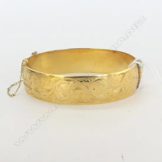 9ct yellow GOLD WITH METAL CORE HINGED BANGLE (20 MICRONS R.)
