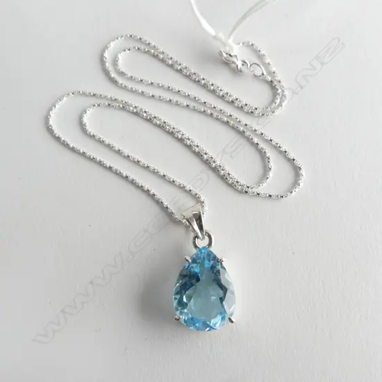 SILVER & PEAR CUT TOPAZ PENDANT ON SILVER CHAIN