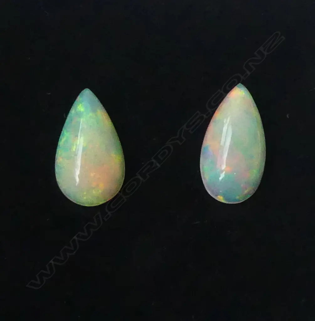 PAIR MATCHING UNSET WHITE OPALS 3.33ct, AIG CERT Image 1++