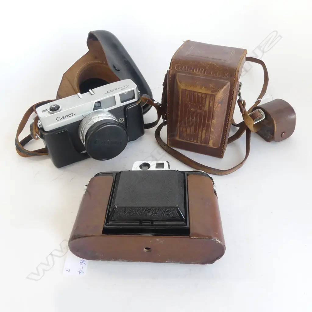 THREE CAMERAS, ONE WITH HORIZONTAL RANGEFINDER, RICOHFLEX MODEL 1V,& CANON CORONET  Image 1++