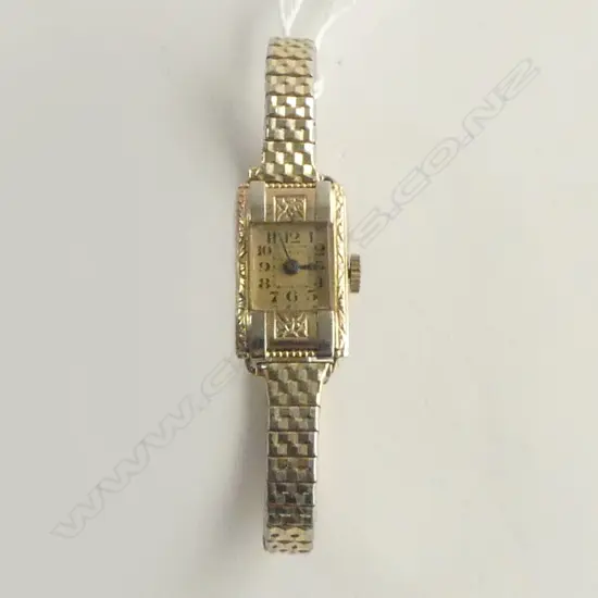 9ct GOLD 'CRAVEN' LADIES ART DECO WRIST WATCH running. Plated strap