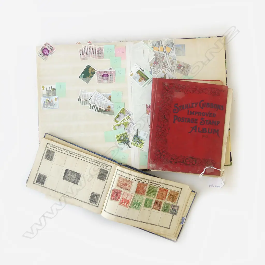 THREE VINTAGE STAMP ALBUMS Image 1++