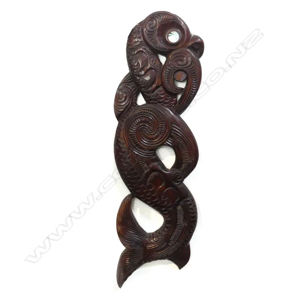 Note to back: ' This carving represents TAHI a friendly Taniwha (serpent), when danger would appear on the waters of the tribe the taniwha would appear also’ and Pakati - 4 distinct cuts of the chisel. A signature' of a carver from Whaika village.' Image 1++