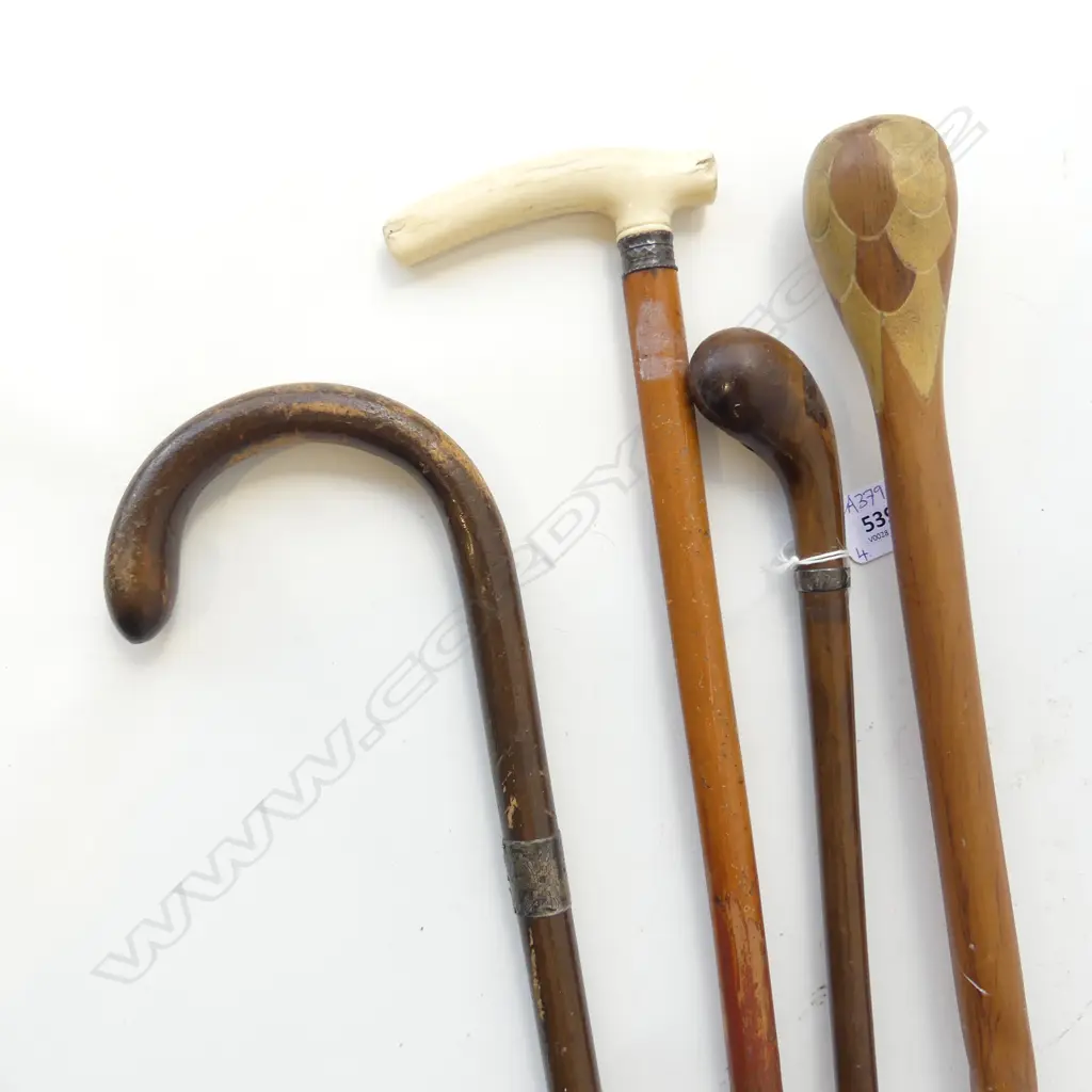 4 WALKING STICKS; 1 w. BONE HANDLE L.930mm Image 1++