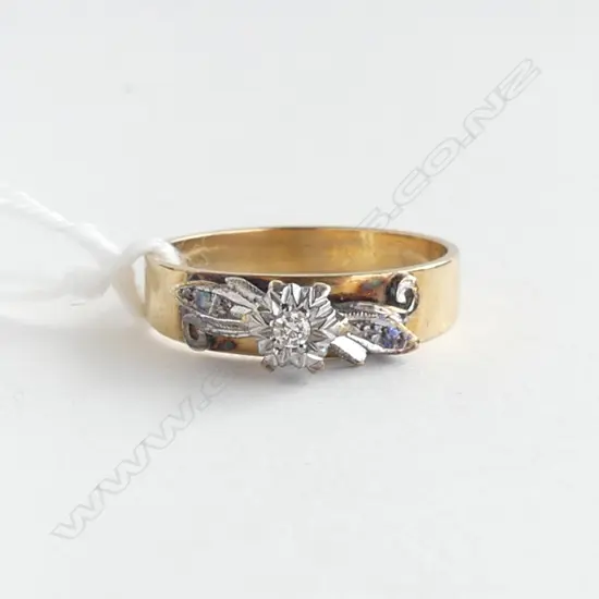 9CT GOLD AND DIAMOND RING  2.95gms (valuation) SIZE O 1/2