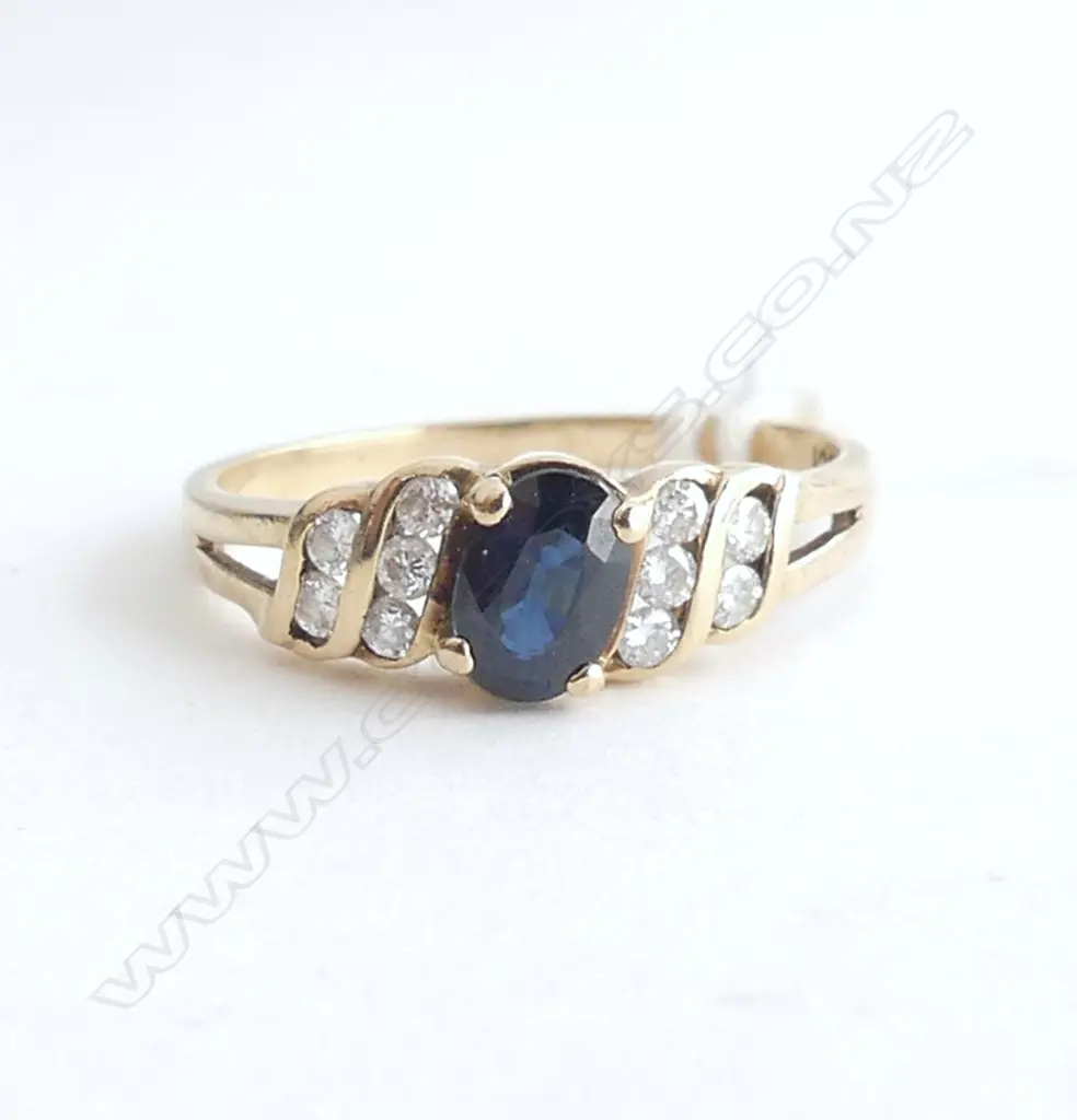 9ct SAPPHIRE & DIAMOND RING DIA=0.25ct 2.1gm SIZE N Image 1++